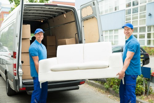 Office relocation planning in Chiswick with boxes and furniture prepared for moving
