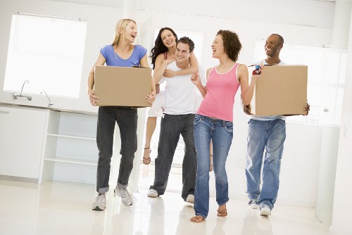 Removal van and moving boxes in a Chiswick residential street