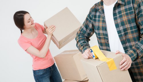Business relocation setup with desks, boxes, and IT items for a Chiswick office move
