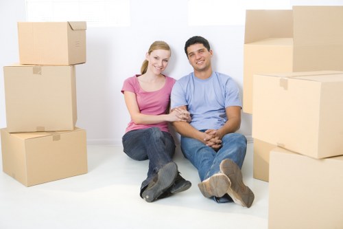 Removal team preparing a move in Chiswick with boxes and furniture