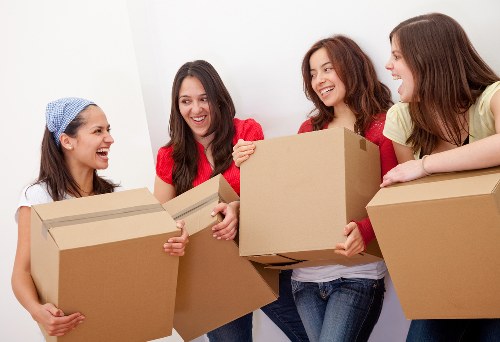 Packed boxes and labelled items ready for a commercial relocation