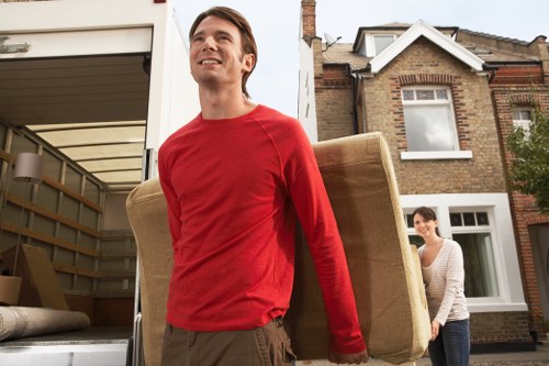Professional movers handling boxes during a local relocation in Chiswick