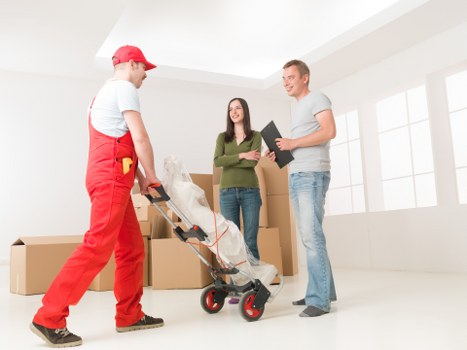 Boxes and furniture being loaded for same day removals in Chiswick