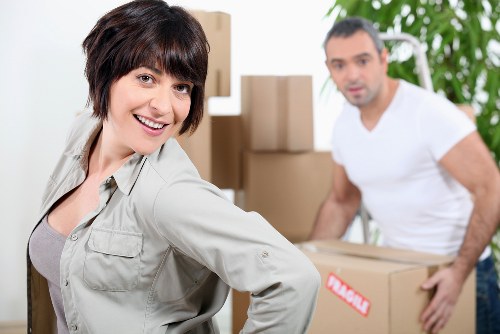 Packed boxes and protected furniture ready for a Chiswick apartment removal
