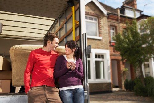 Careful wrapping and labelling of household items during a move in Chiswick
